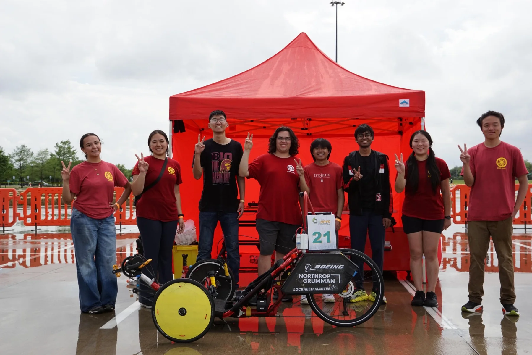 The USC recumbent vehicle team with their vehicle at ASME eHPVC